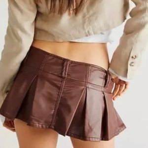 Never worn with tags Free People pleated brown faux leather mini skort